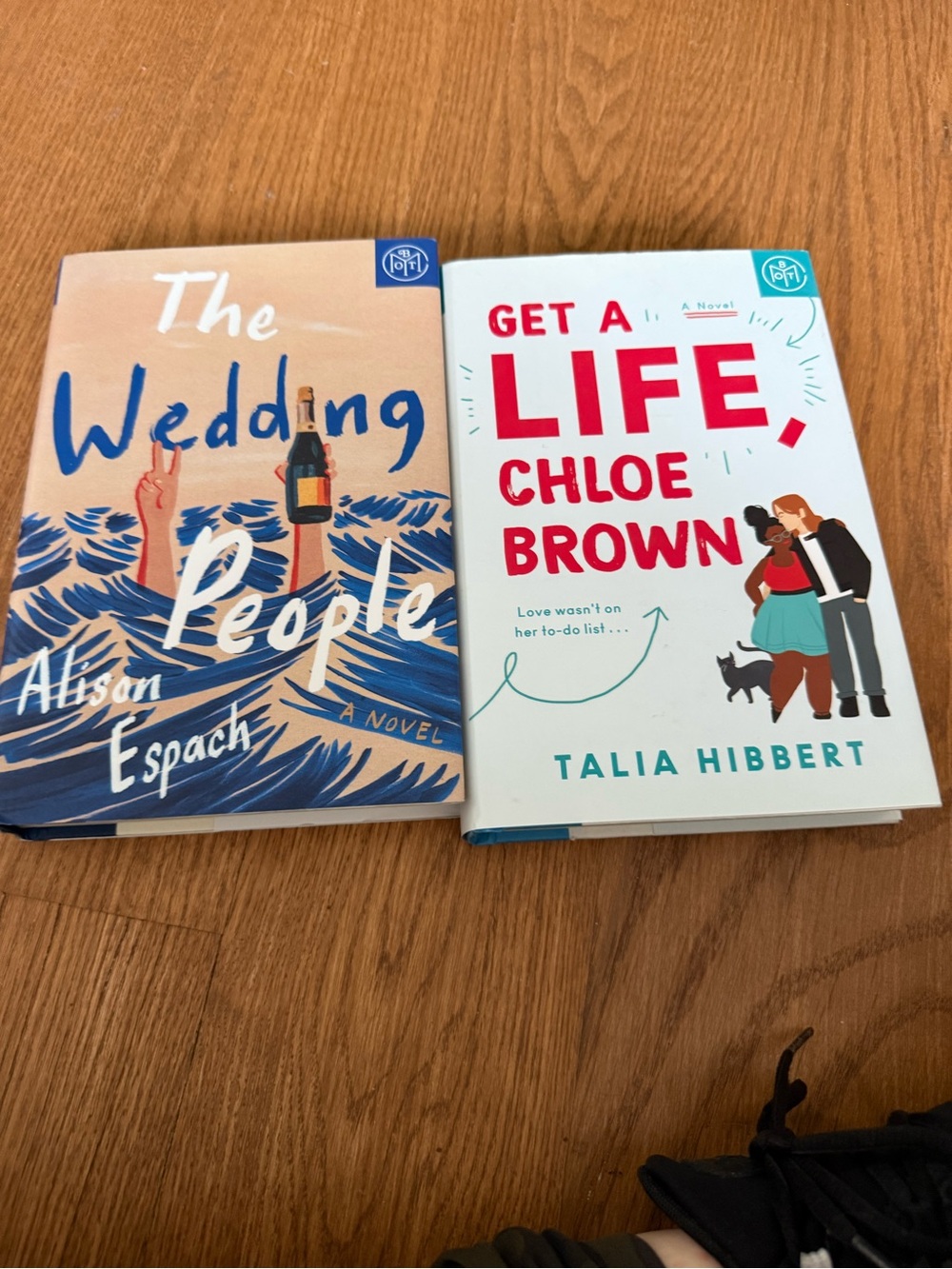 Pair of hardcover fiction books - like new